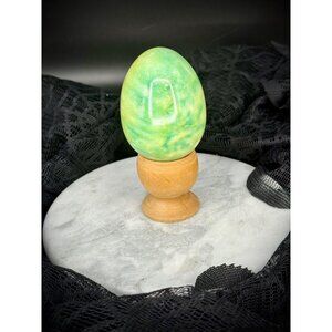 Serpentine egg with wood stand